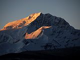 
Shishapangma East Face shines at sunrise from Shishapangma North Base Camp (5029m). The North Face is in shadow to the right.
